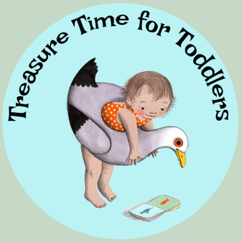 Toddler in a bathing suit and seagull float ring pointing to sea creatures in a board book with Treasure Time for Toddlers caption.