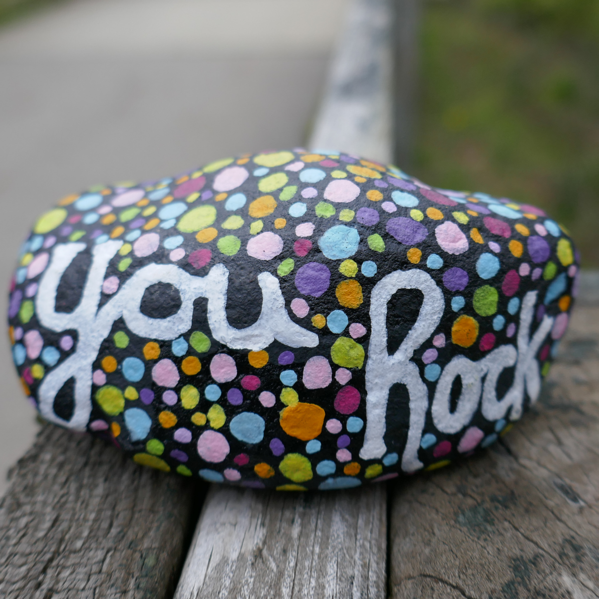 Painted rock with Your Rock lettering